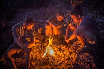 The night's camp of the second day. Each of us enjoys the campfire after 22 kilometers of marching.
