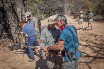 The shooters have to build 'muscle memory', i.e. the cycle 'load rifle, aim, shoot' must become flesh and blood. This can be crucial for survival in dangerous situations.