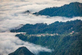 View from the Vereda do Arieiro hiking route to a coastal settlement in the northeast.