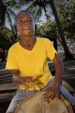 Jeremy’s fingers work the drumhead with a precision that belies his age of just 8 years. What a talent!